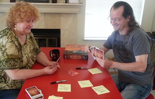 Team playing Dixit retrospective game Team playing Dixit retrospective game